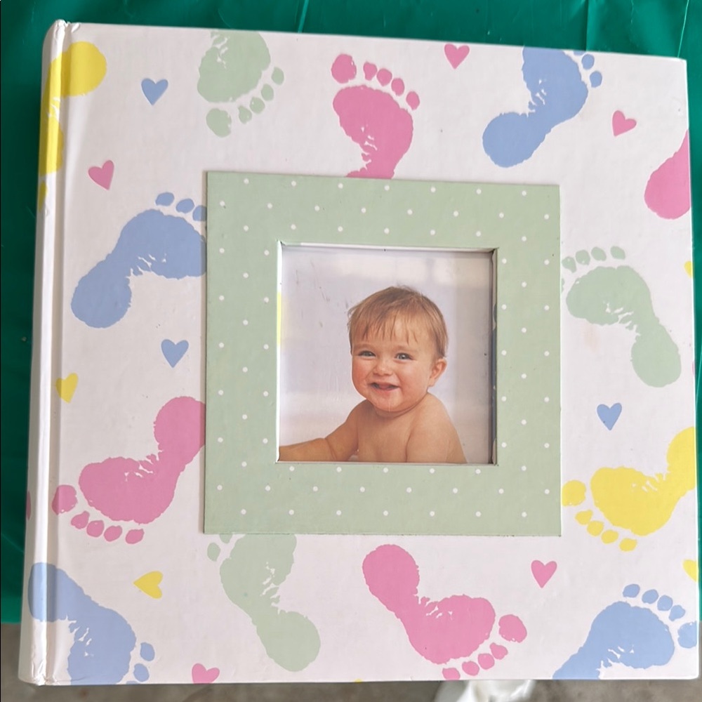 Colorful Baby Photo Album Brand New. A few pages are crunched as shown in pict